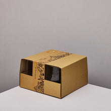 Cardboard box containing 4 glass tumblers